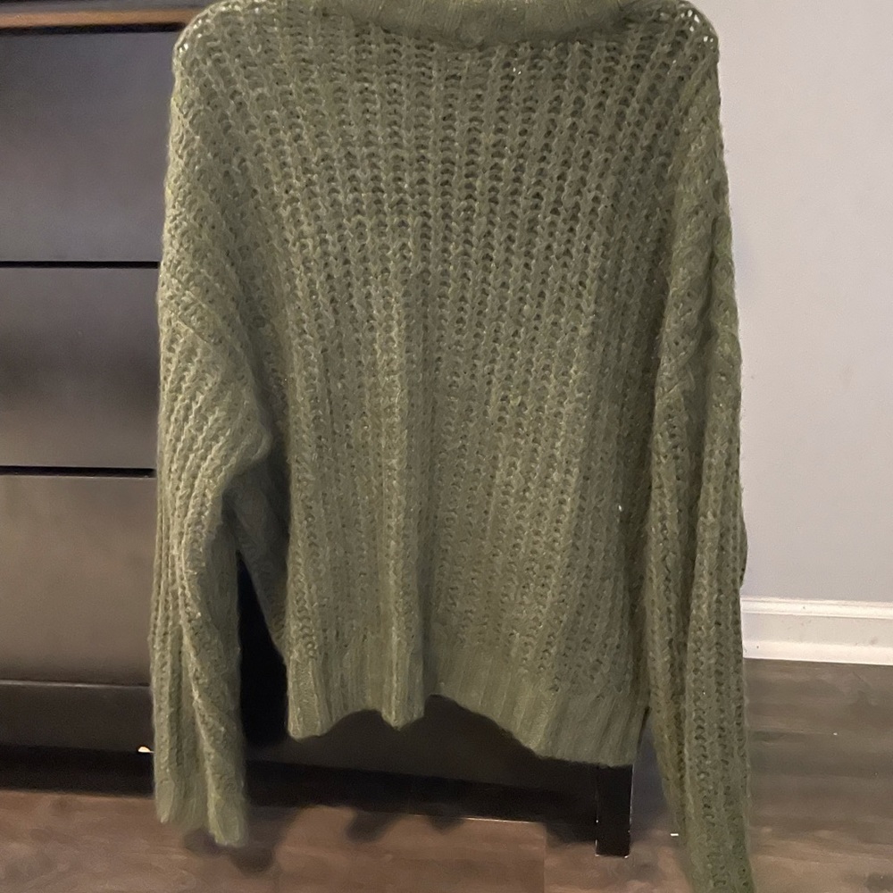 Green puffy sweater